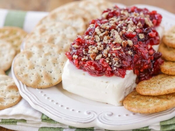 Cranberry cream cheese dip served with crackers.