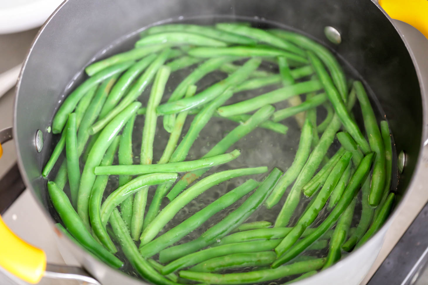 Process pics for blanching green beans before making fried green beans.