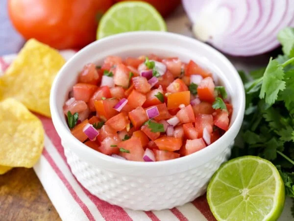 Fresh pico de gallo served in a white ramekin.