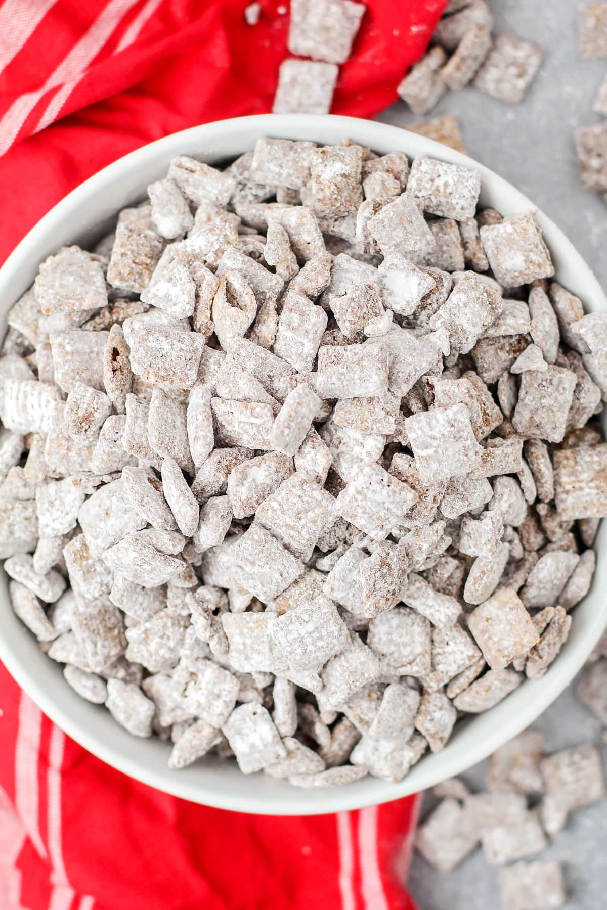 Homemade Puppy Chow recipe in bowl close up image.