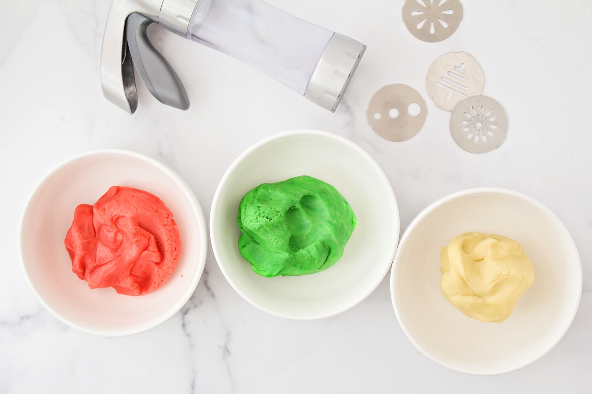 How to make spritz cookies with a cookie press.