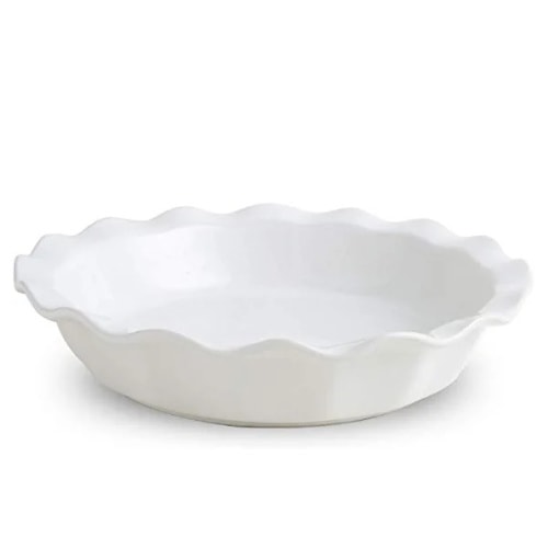 Ceramic white pie dish with scalloped edges.