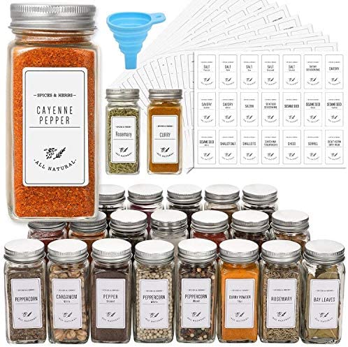Kitchen organization ideas - Glass spice jars with printed sticker labels and a collapsible silicone funnel for easy filling.