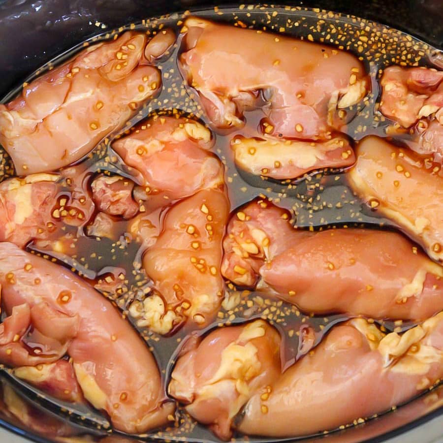 Chicken in teriyaki sauce in slow cooker.