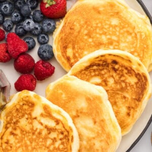 Protein Pancakes are quick, filling, and easy with eggs, whey protein powder, baking powder, and water or almond milk.