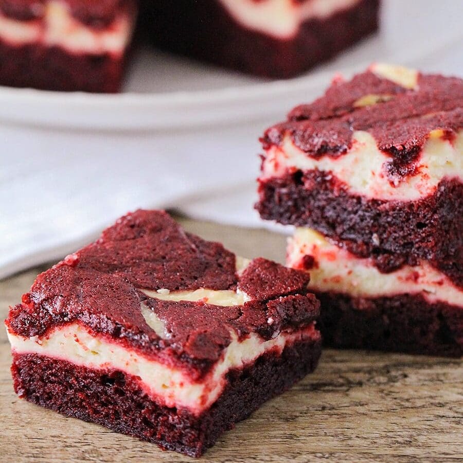 Red velvet cheesecake brownies cut into squares.