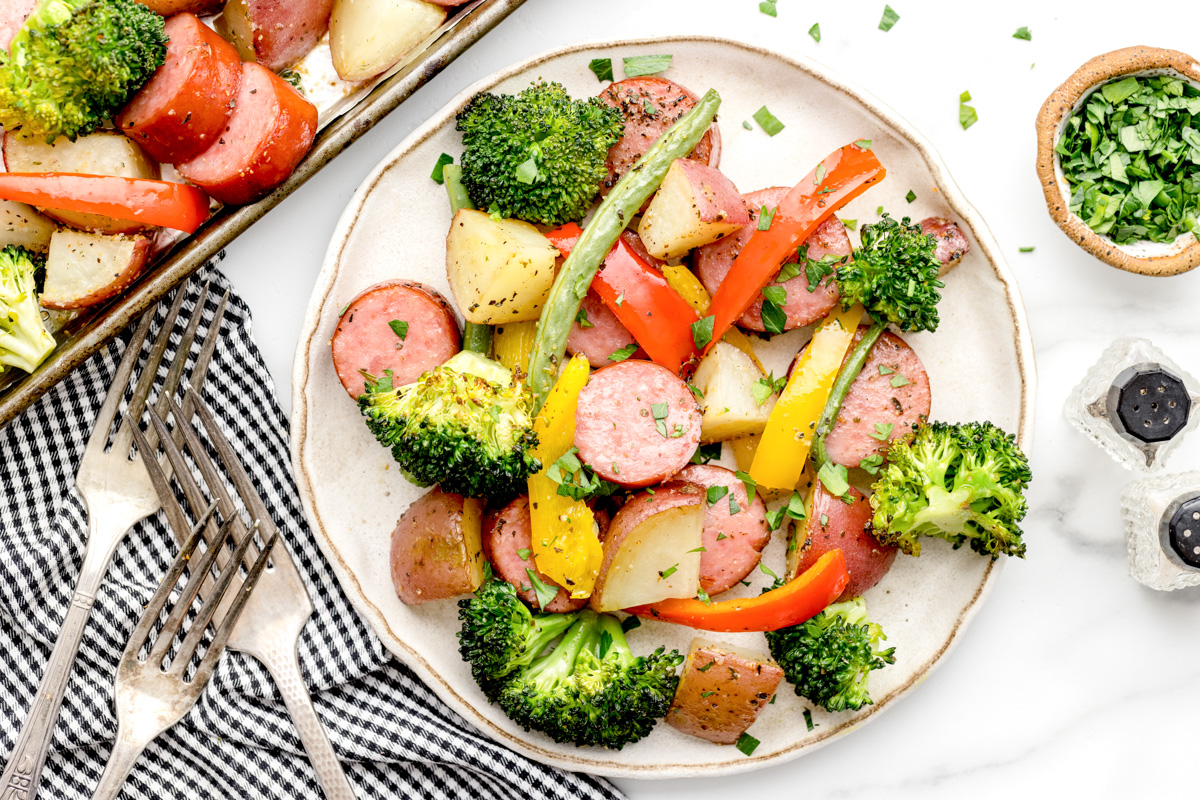 Sheet Pan Sausage and Veggies served on a white plate.