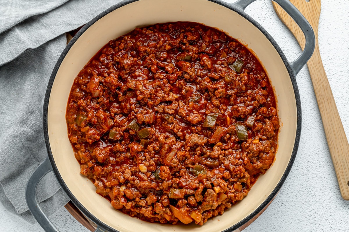 Cooked meat and sauce for making homemade sloppy joes.