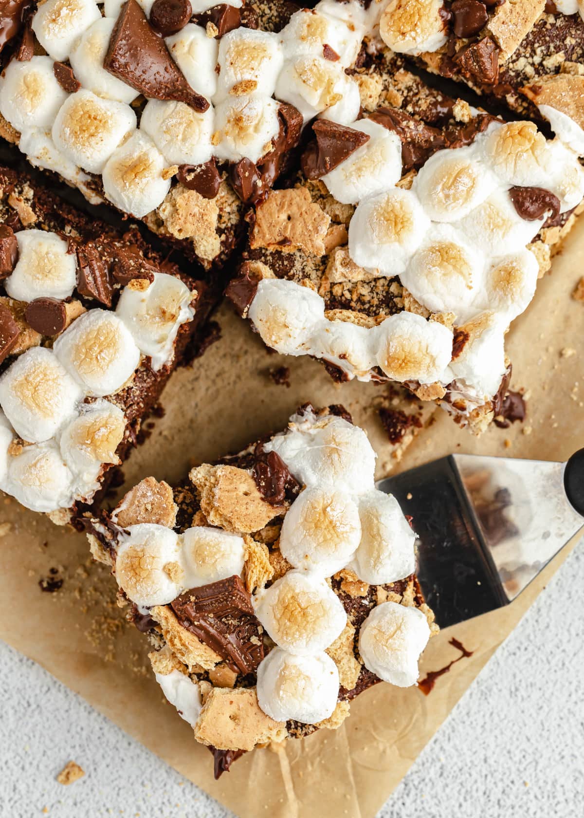 S'mores brownies sliced and pulled from the pan.