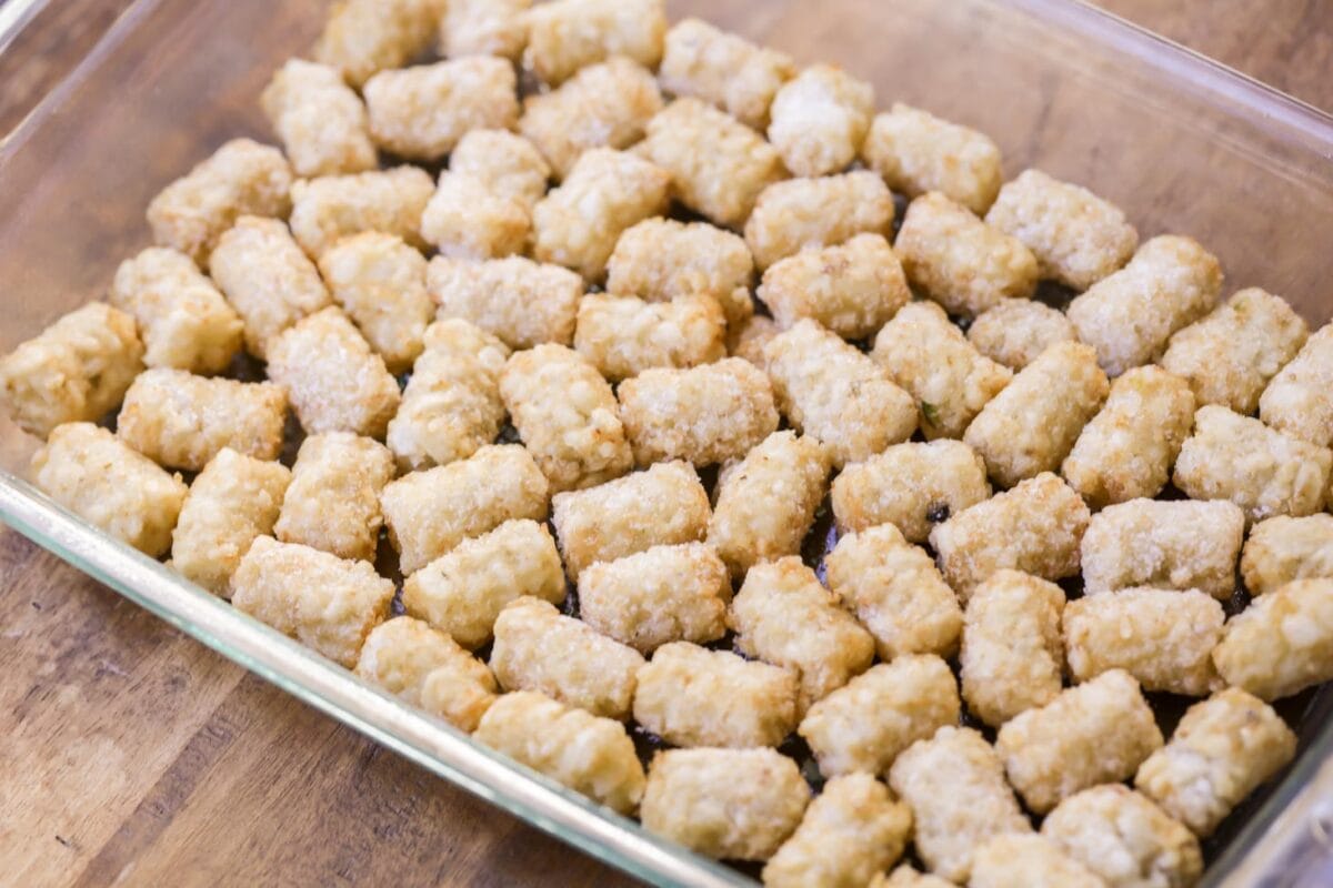 Tater tots on the bottom of a casserole dish.