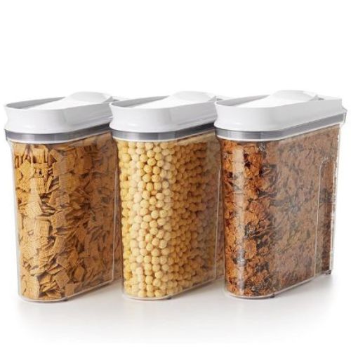 Pantry Organization Ideas - three clear plastic cereal containers with cereal in them.