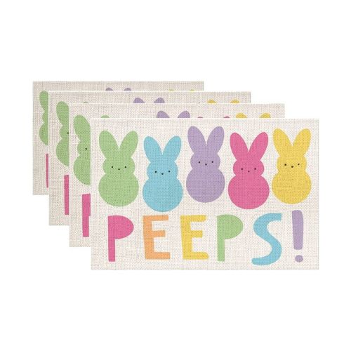 White placemats with pastel colored bunnies and PEEPS! printed on it.