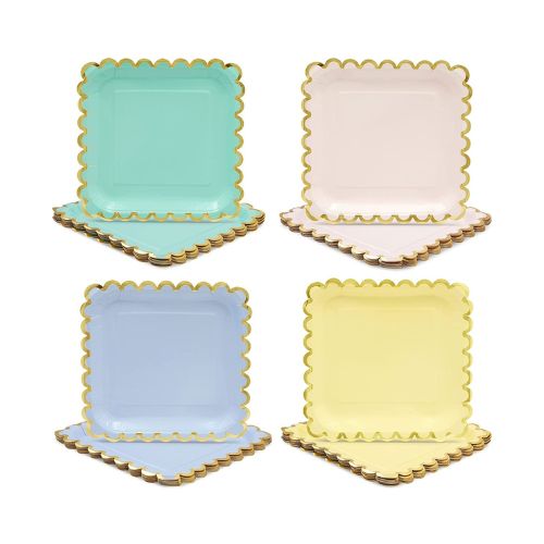 Four different pastel colored square plates with gold scalloped edges.