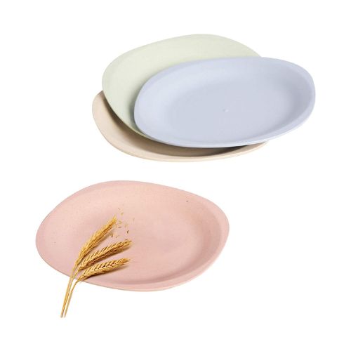 Four small plates in different pastel colors.