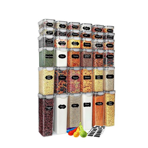 Pantry Organization Ideas - a set of several clear plastic food storage containers containing various dry foods.