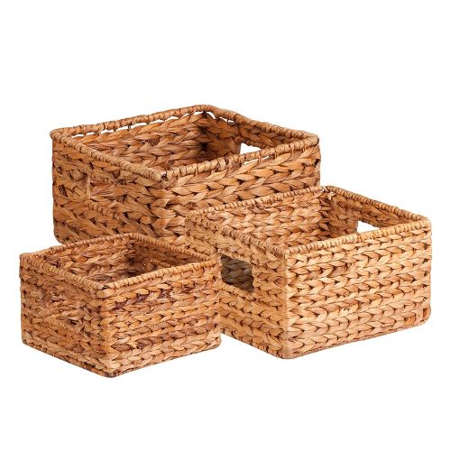 Pantry Organization Ideas - set of three different sized natural colored woven baskets.