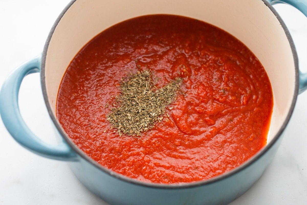 Pasta sauce for covering baked ravioli.