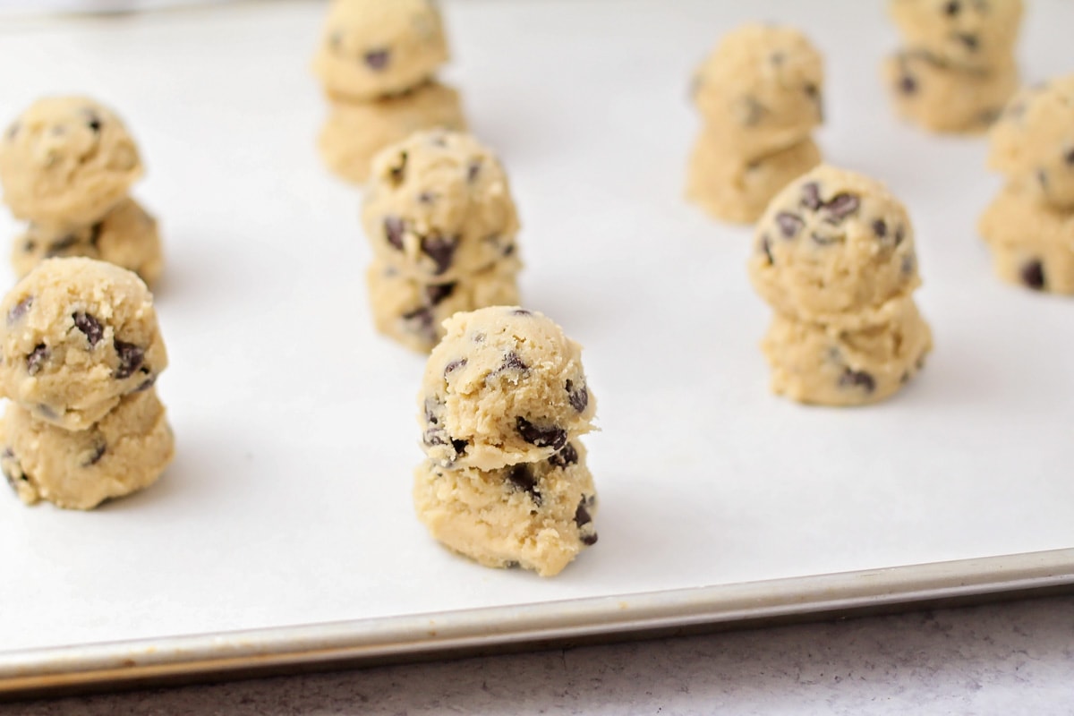Double stacked balls of chocolate chip cookie dough.