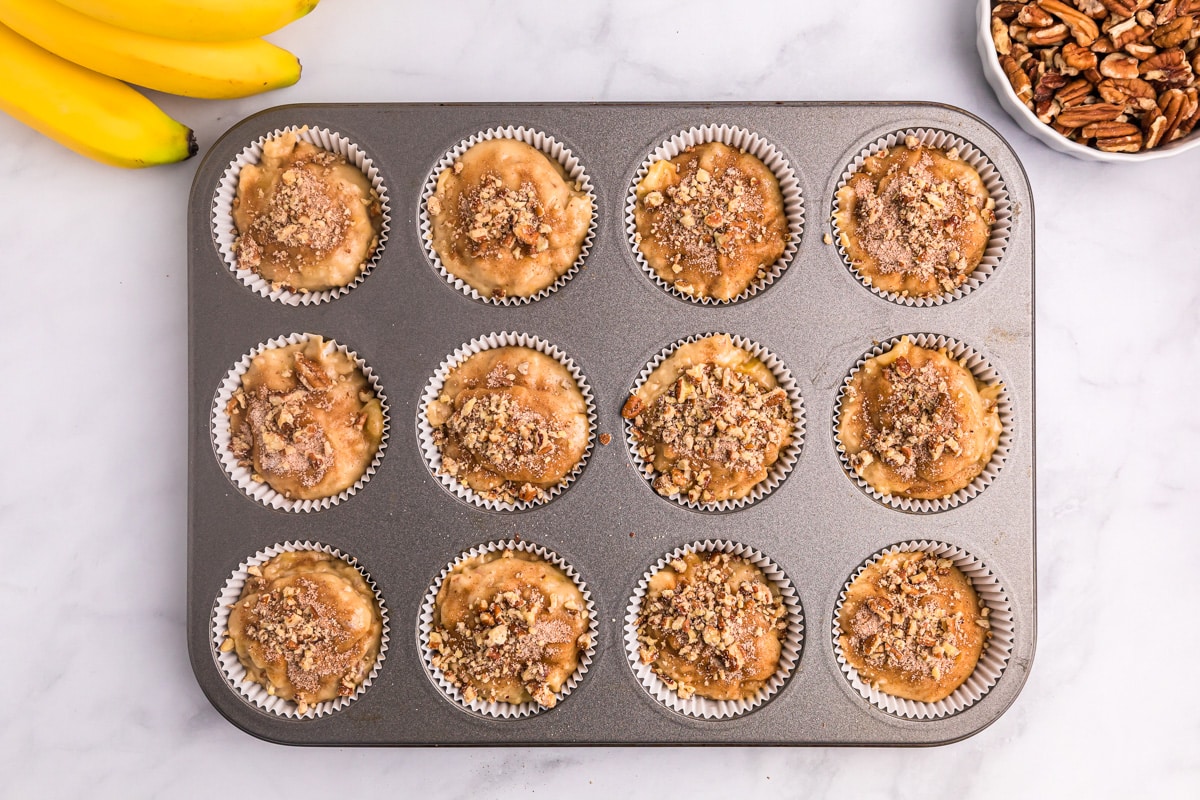 Pecan topped banana muffins recipe ready to be baked.