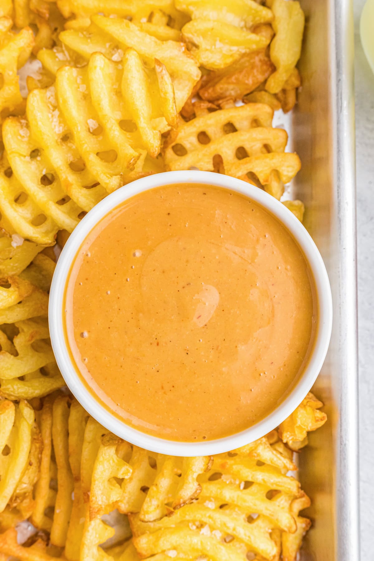 Chick fil a sauce served with waffle fries.