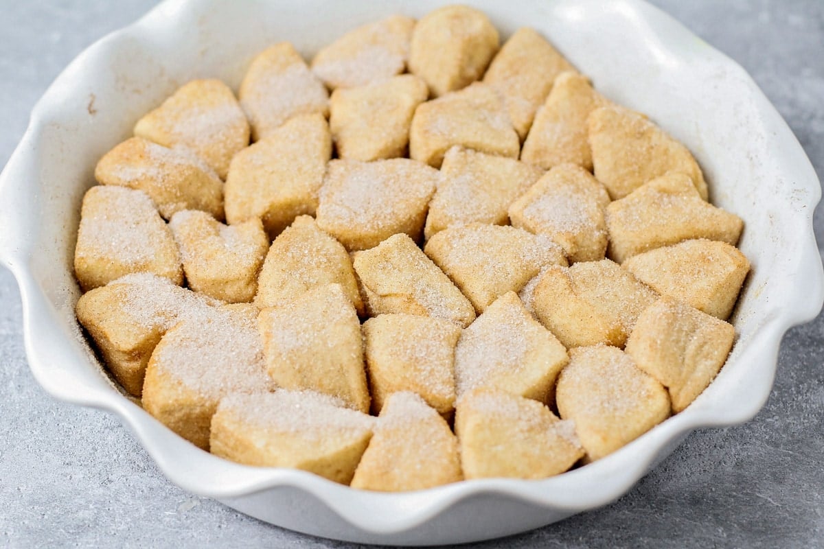 Cinnamon bites in a pie plan ready for baking.