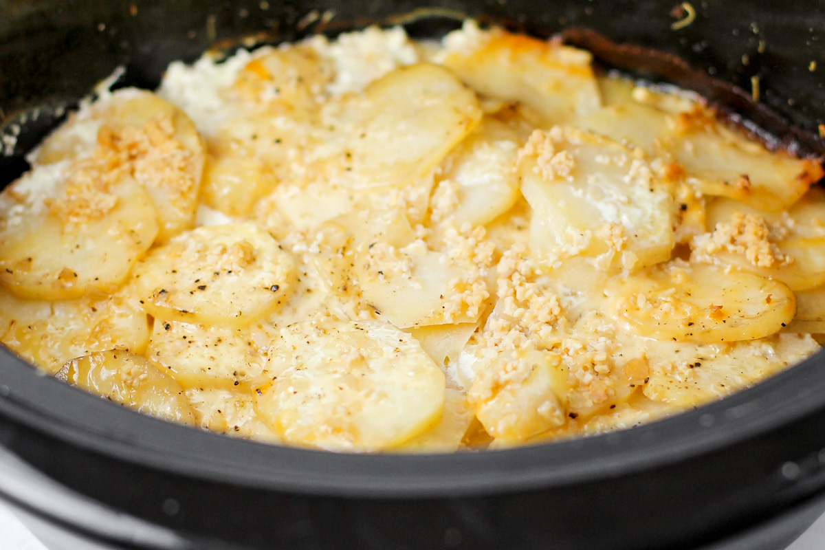 How to make crock pot scalloped potatoes recipe process shot.