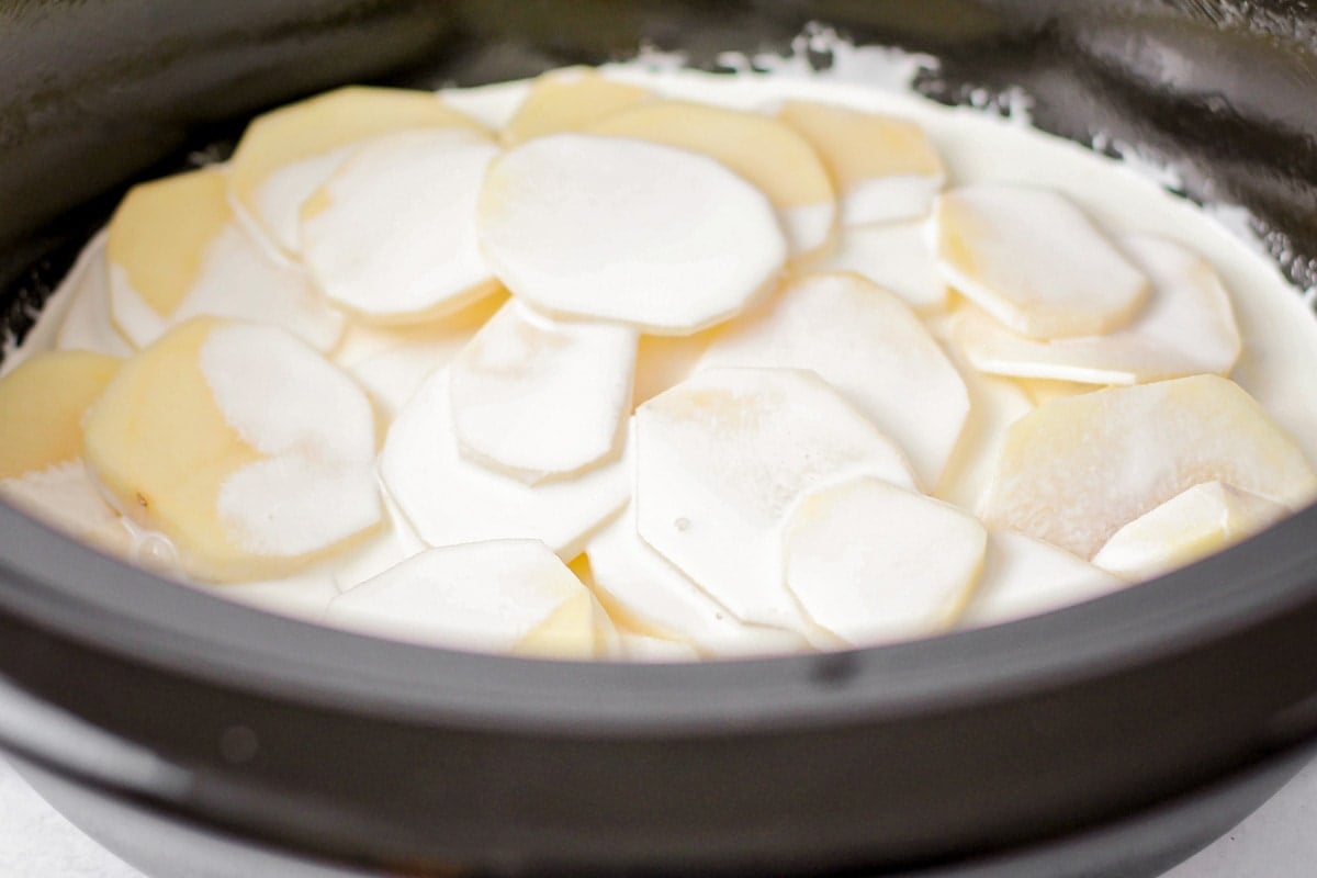 How to make crock pot scalloped potatoes process shot.