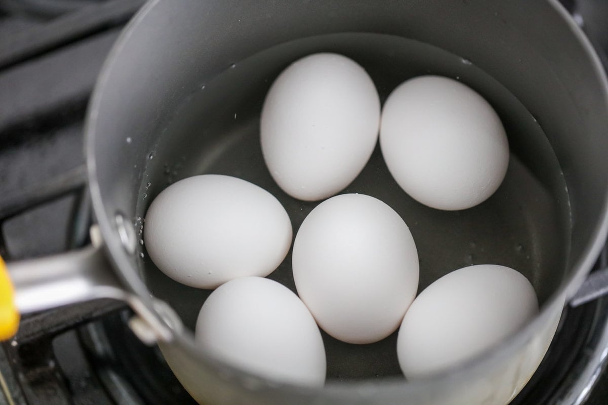 Boiling eggs for how to make egg salad.