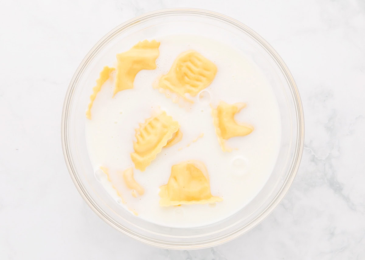 Ravioli in a bowl of milk.