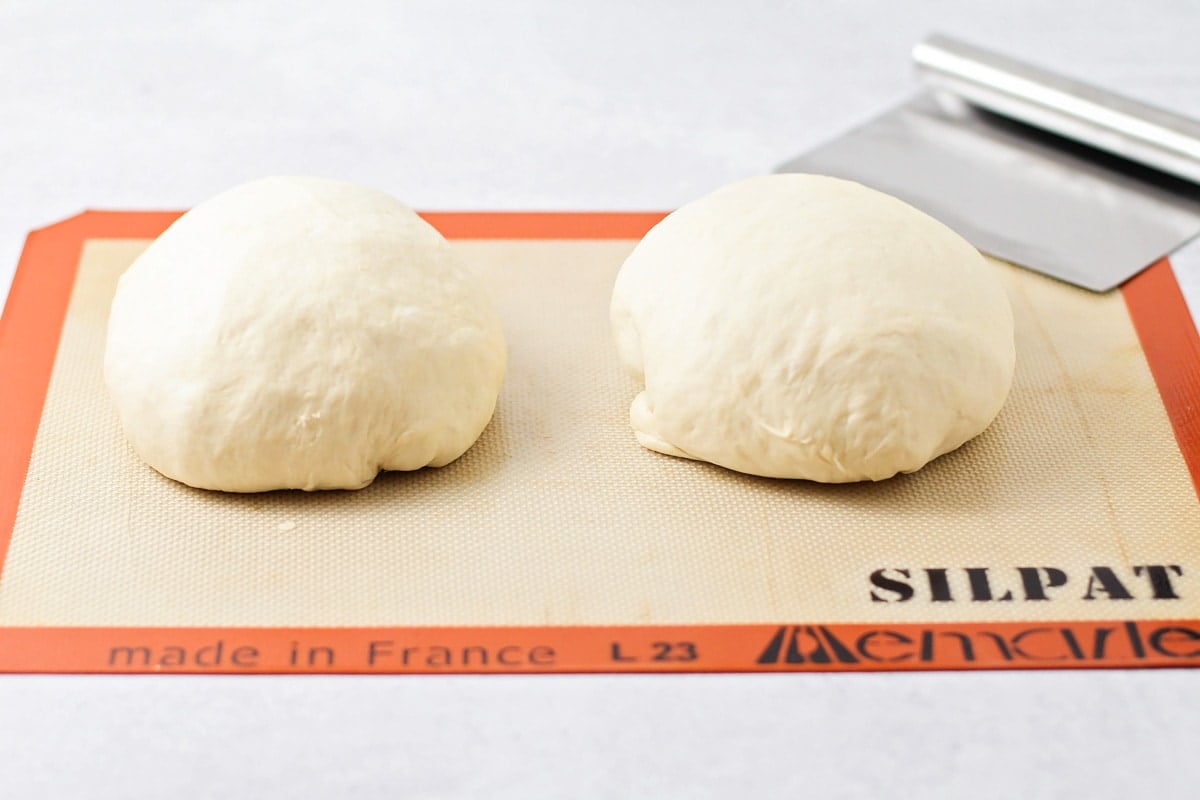 Cutting, rolling, and prepping Italian loaves for baking.