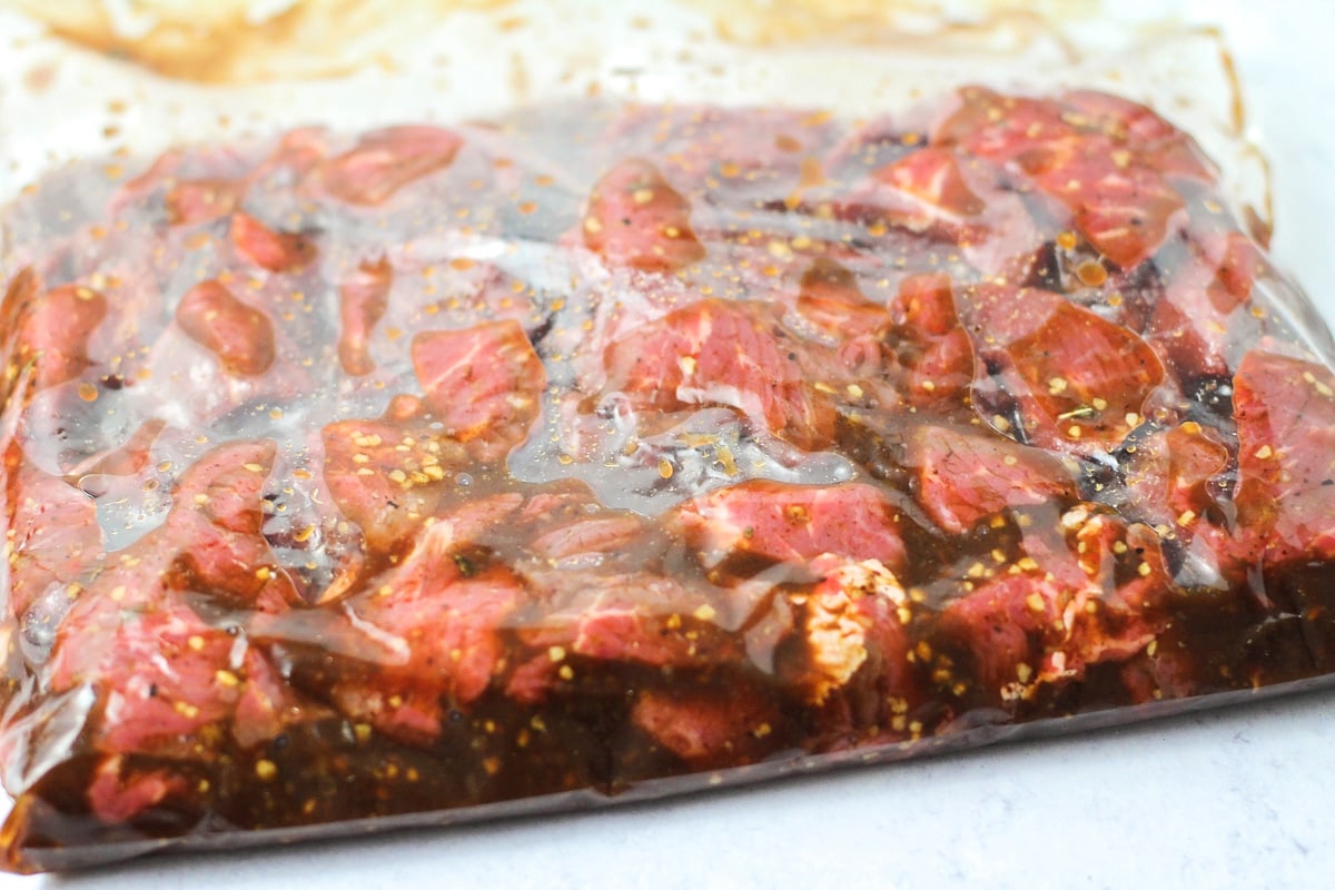 Steak bites recipe marinating in a ziploc bag.
