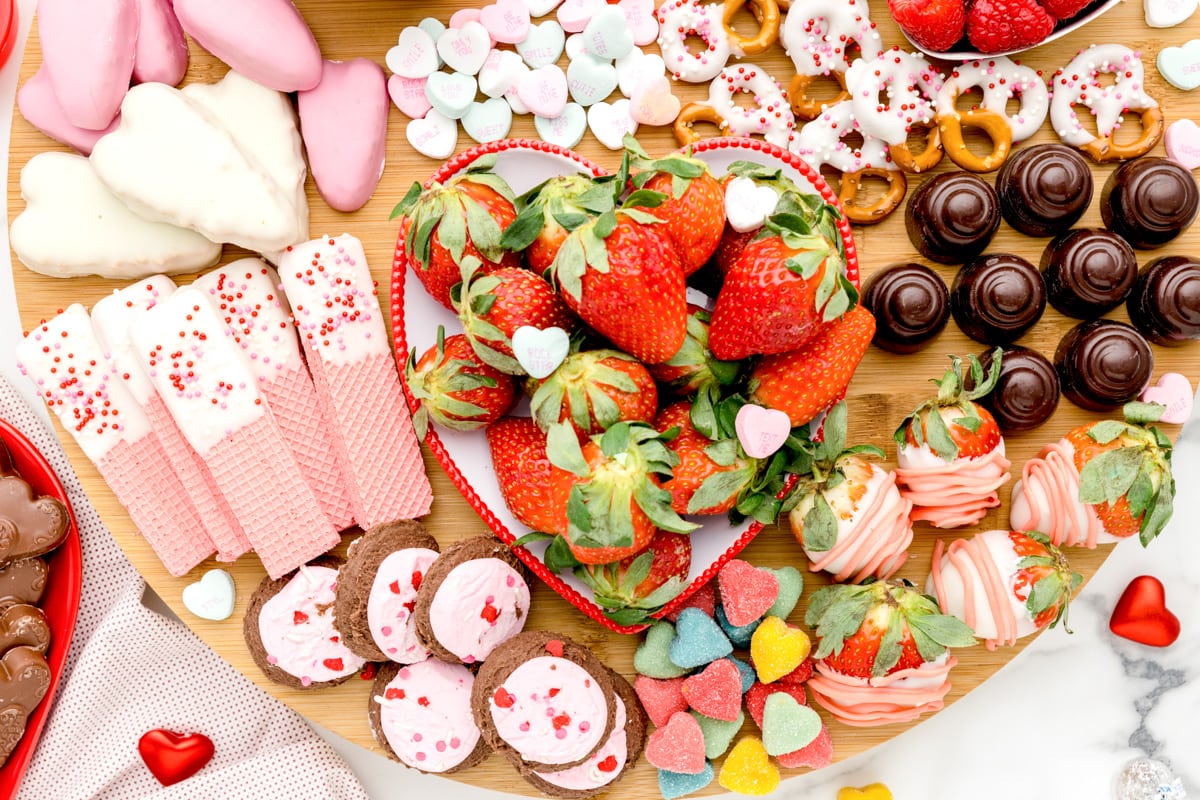 Close up of sweet treats on a Valentine's charcuterie board.