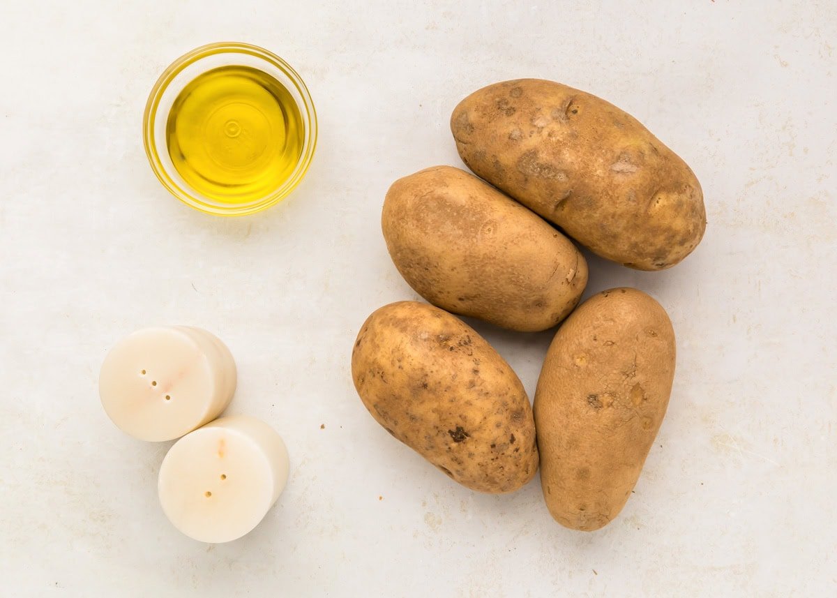 Ingredients for the perfect baked potato recipe in counter.