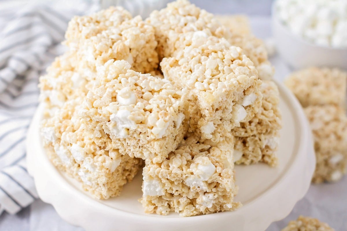 A plate of stacked rice krispie treats.