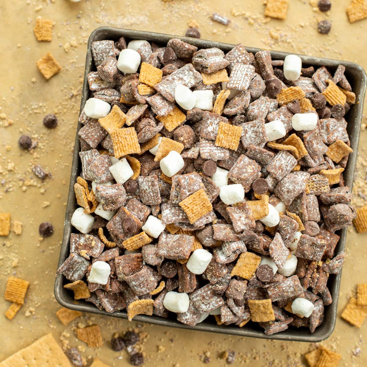S'mores Puppy Chow in a baking dish for eating.