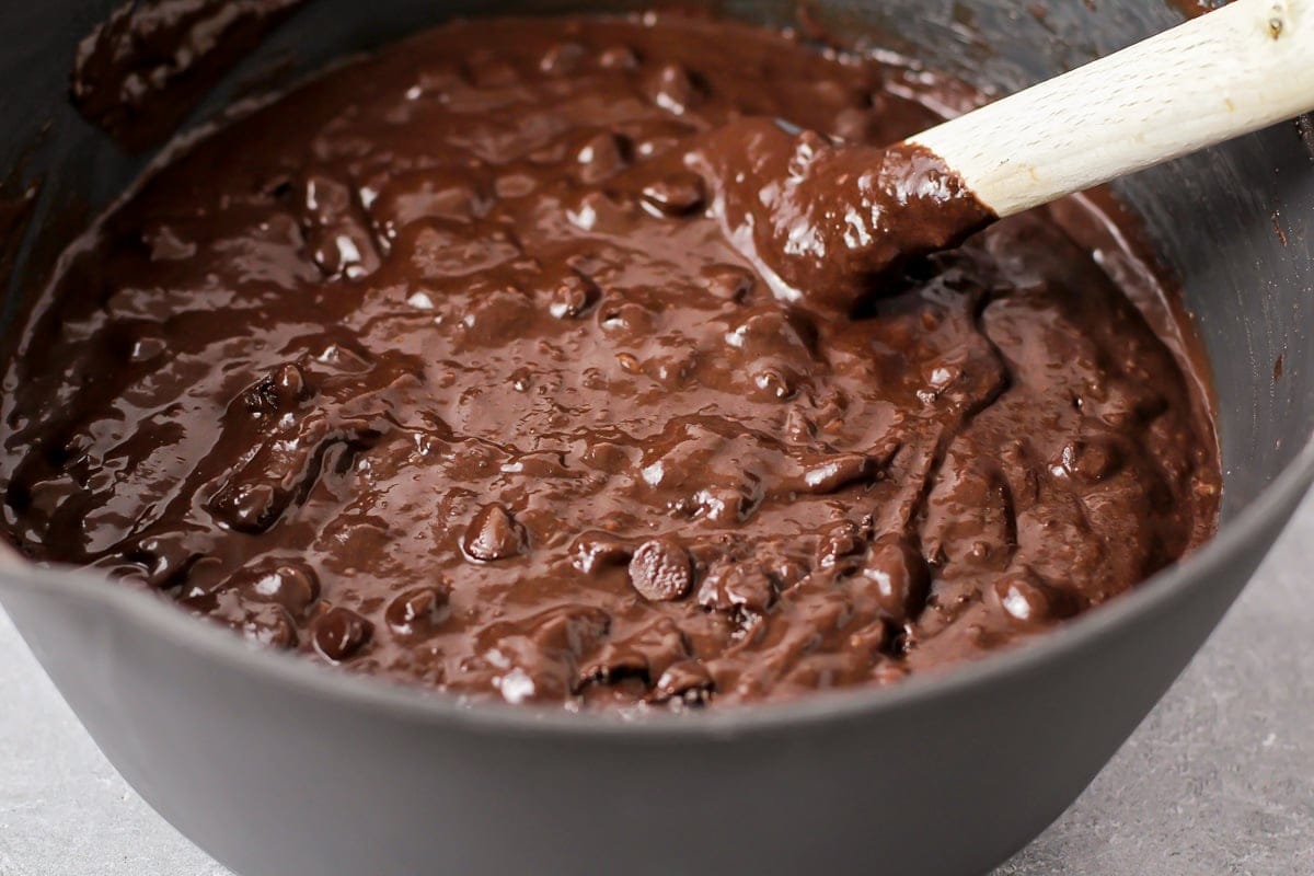 Chocolate batter in a gray bowl.