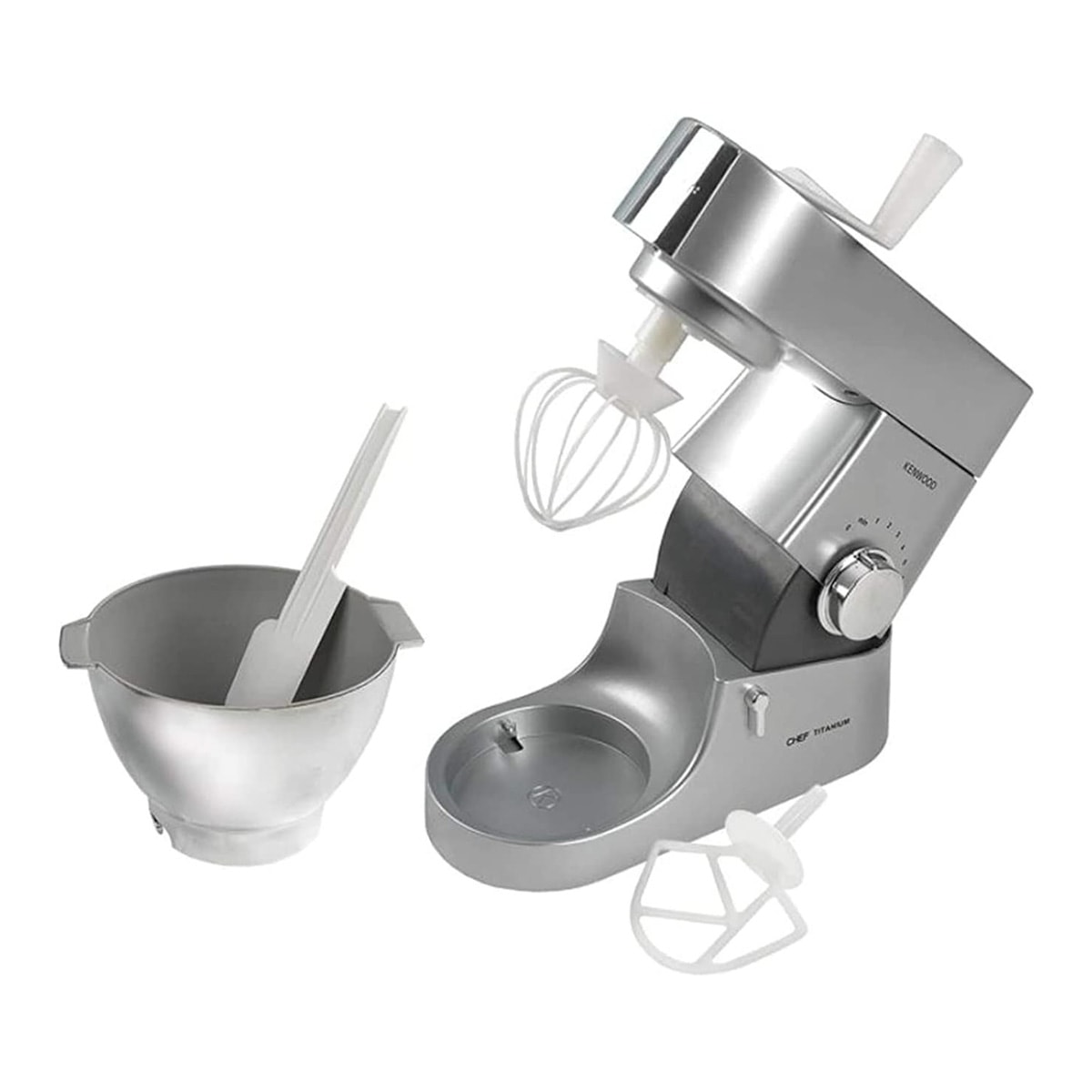 A small stainless steel-looking stand mixer with a matching bowl, two white attachments and a white spatula.