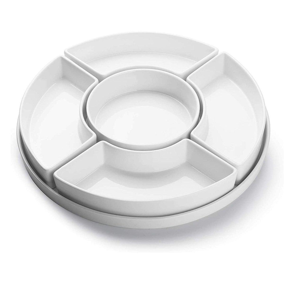 A circular white porcelain serving dish with multiple removeable compartments.