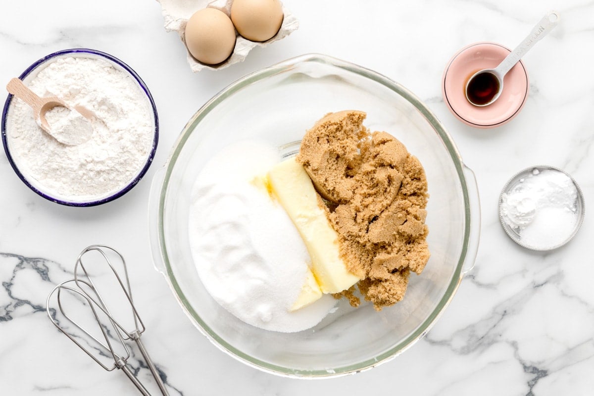 Ingredients for butterscotch cookies in a glass bowl.