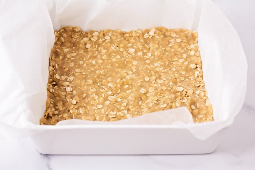 Oat based pressed into baking dish.