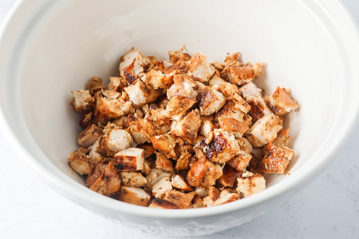 Cubed chicken for chicken alfredo bake.