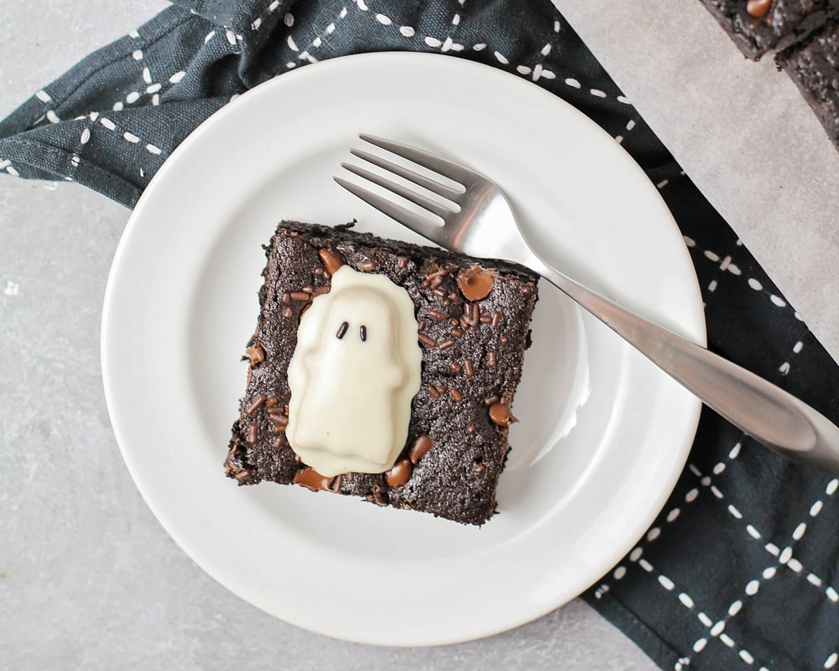 A brownie square topped with a Reese's Ghost.