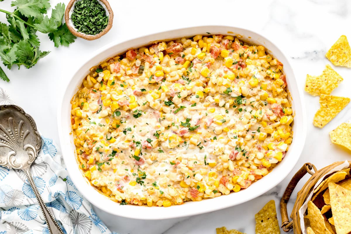 A casserole dish of hot corn dip.