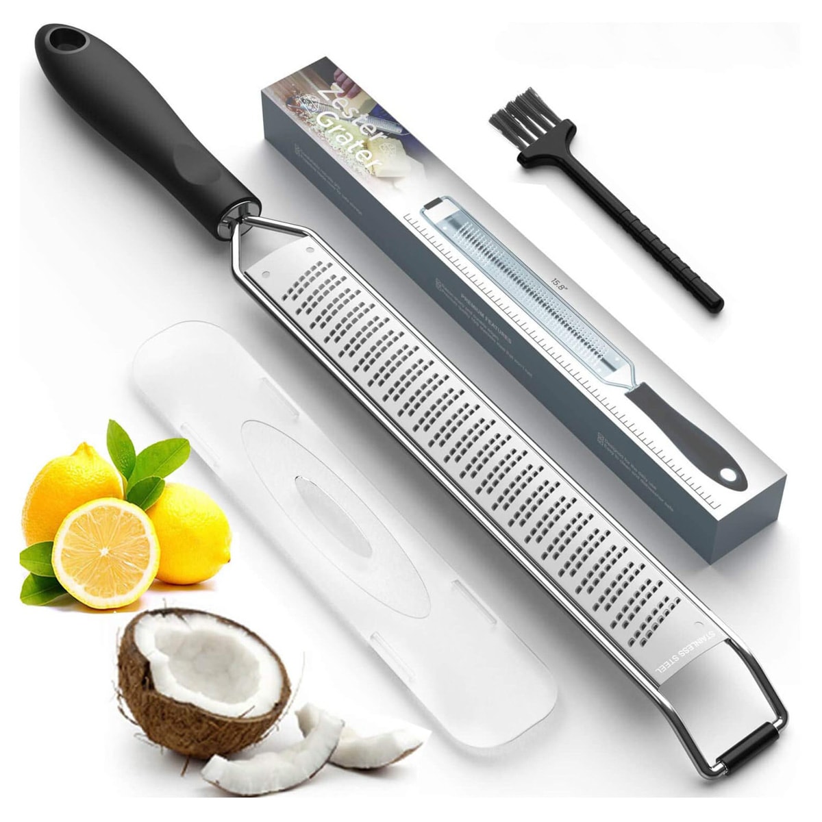 A zester outside of the box next to a picture of lemons and a cut-up coconut.