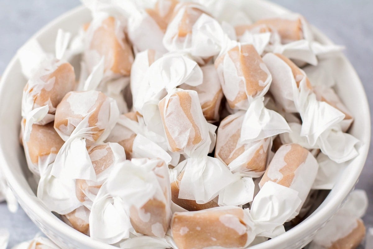 Caramels wrapped in wax paper.