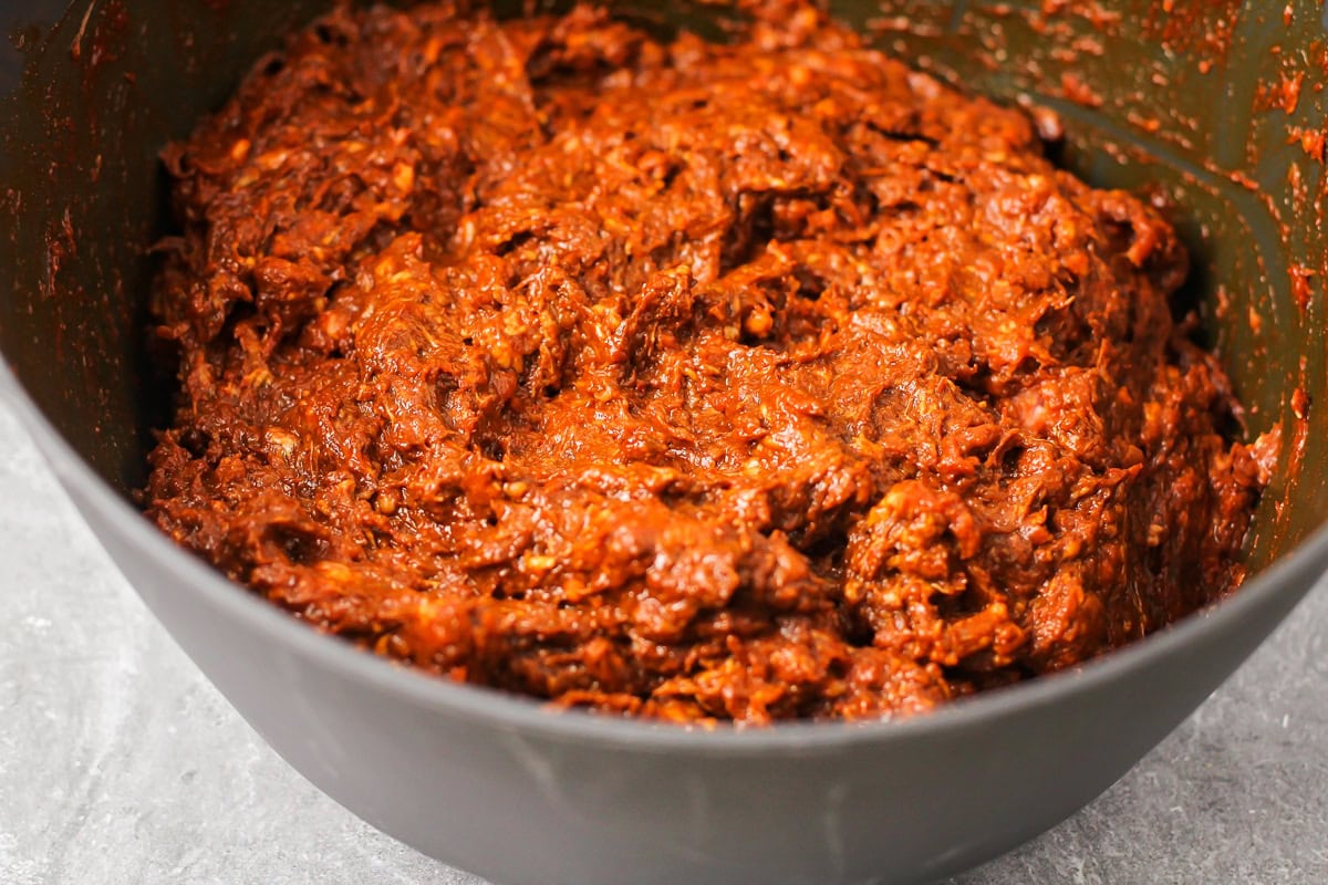 A bowl of chorizo meat and seasonings.