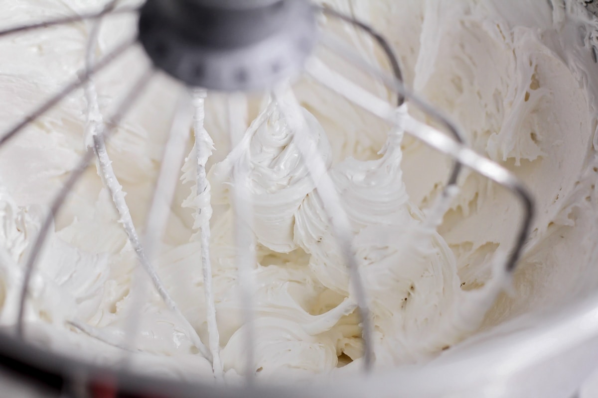 Egg whites whipped in a stand mixer.