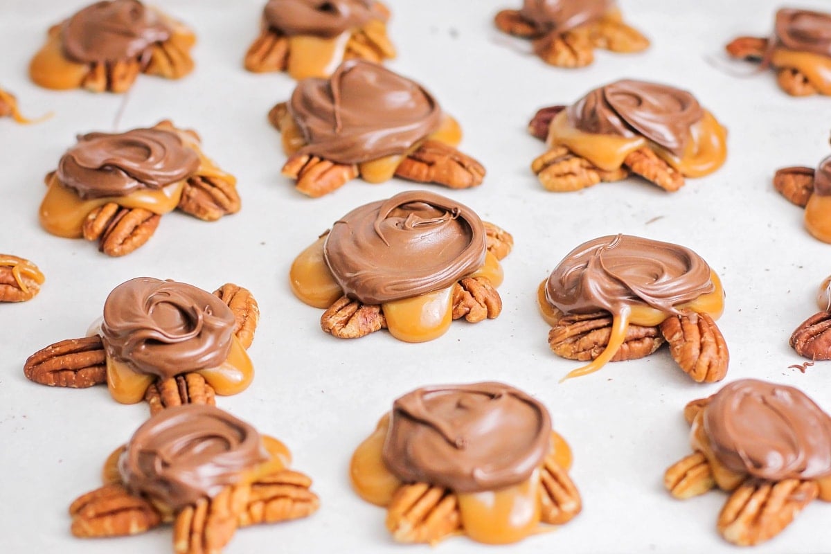Turtle clusters topped with caramel and chocolate.