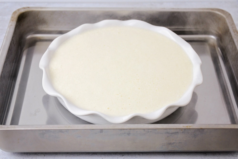 Custard in a baking dish ready to be baked.