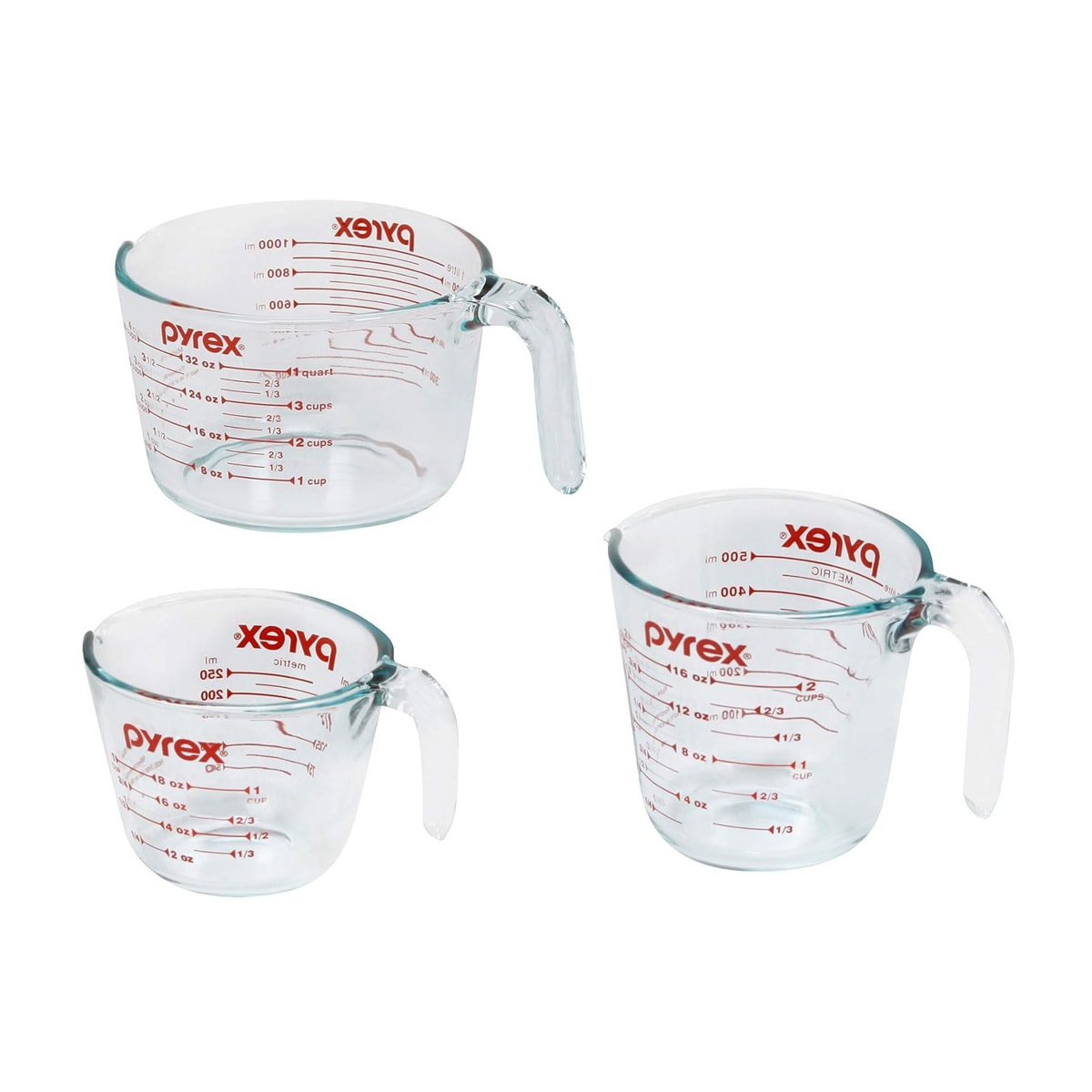Three glass Pyrex measuring cups.